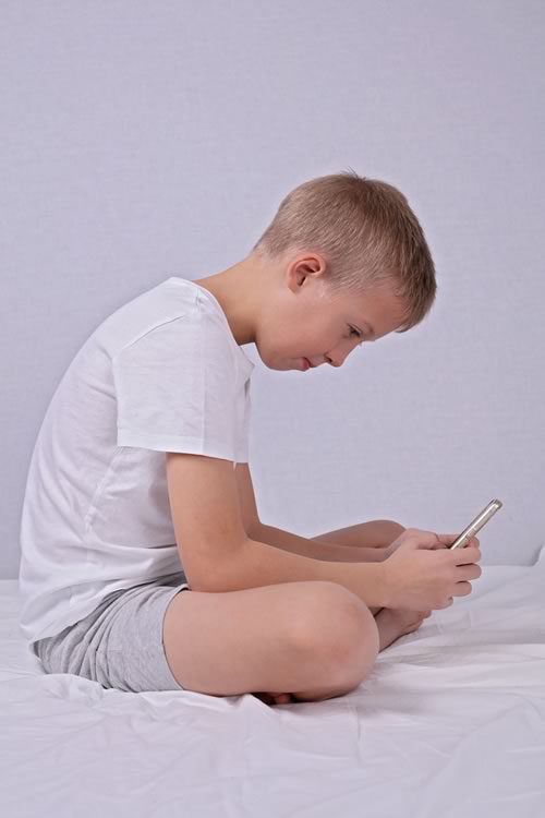 Poor Posture Playing Games on Cell Phone